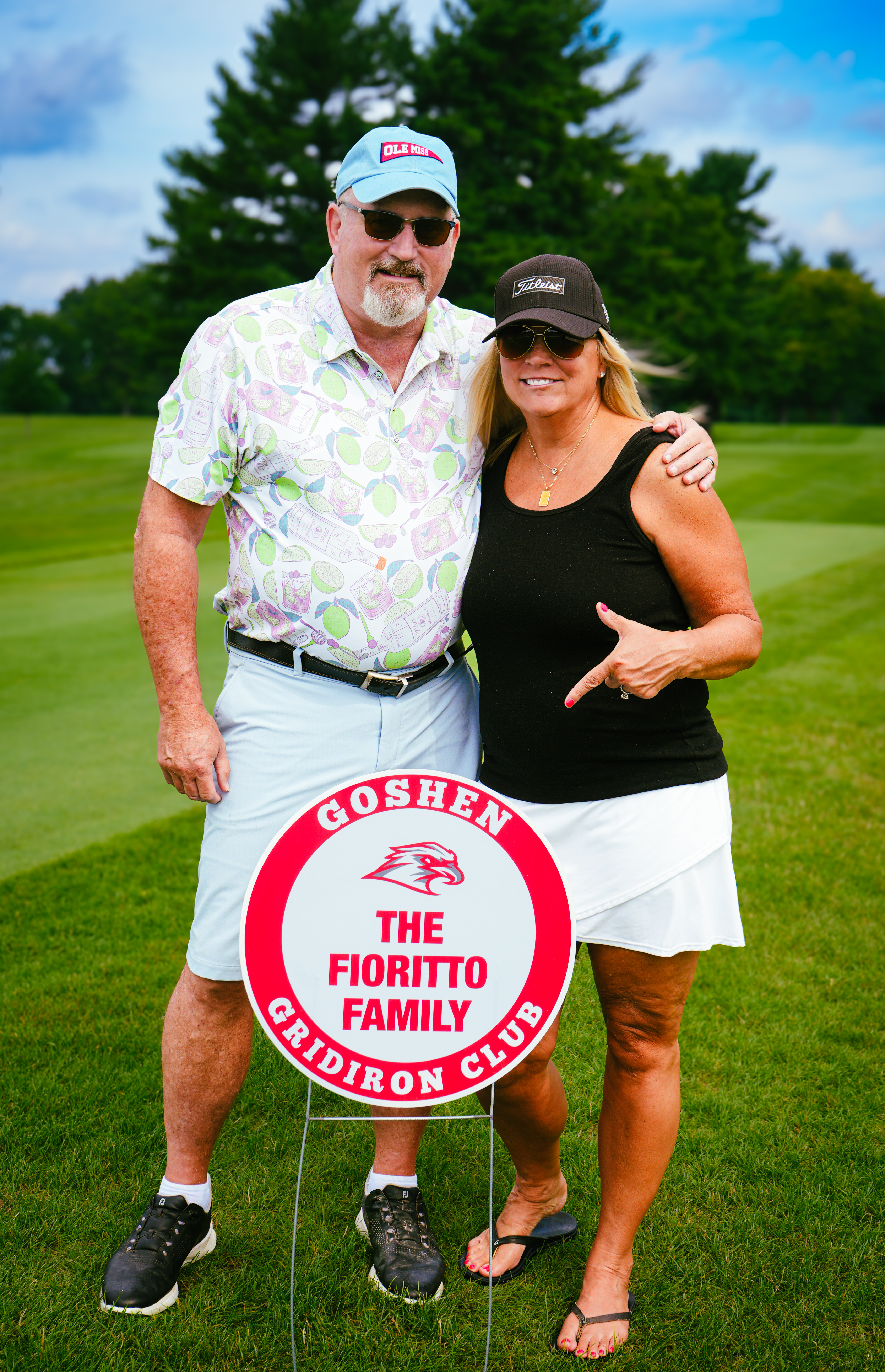 Photo of Mark Fioritto and his wife at the 2025 Goshen Gridiron Golf Outing.